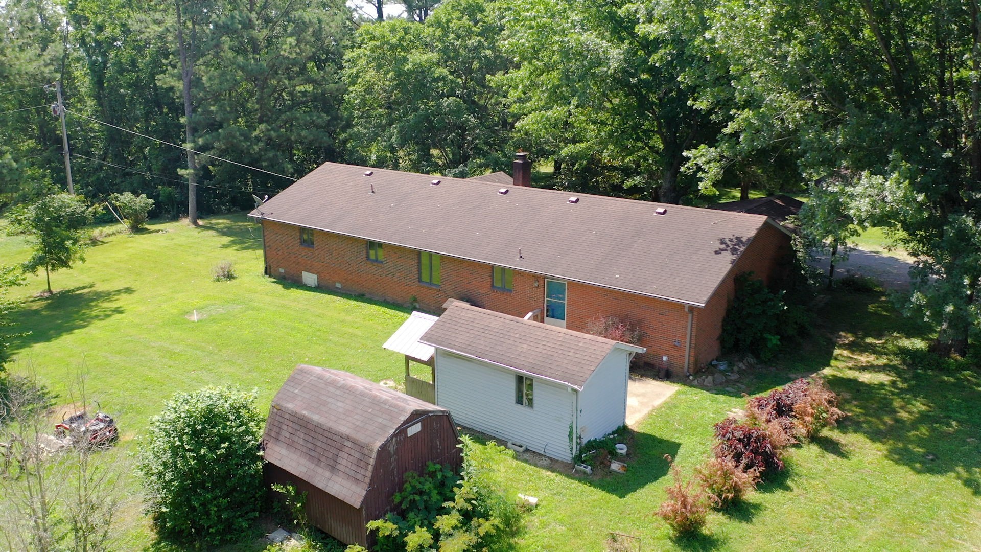 6714 Lee Road Smyrna, TN 37167 - Photo 67 of 70 an aerial view of a house with garden space and a patio