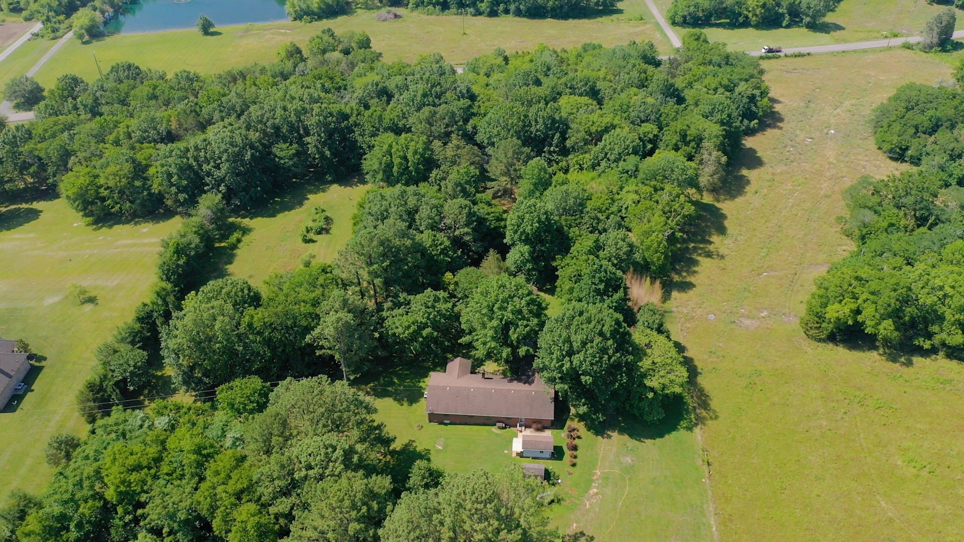 6714 Lee Road Smyrna, TN 37167 - Photo 68 of 70 an aerial view of a house with a yard and lake view
