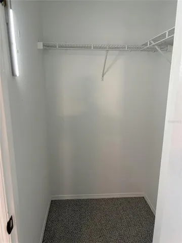 a view of a room with shelf with the shower