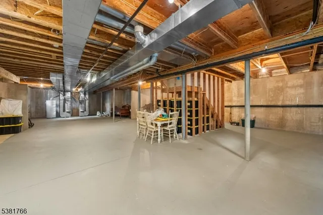 a view of a studio with wooden floor
