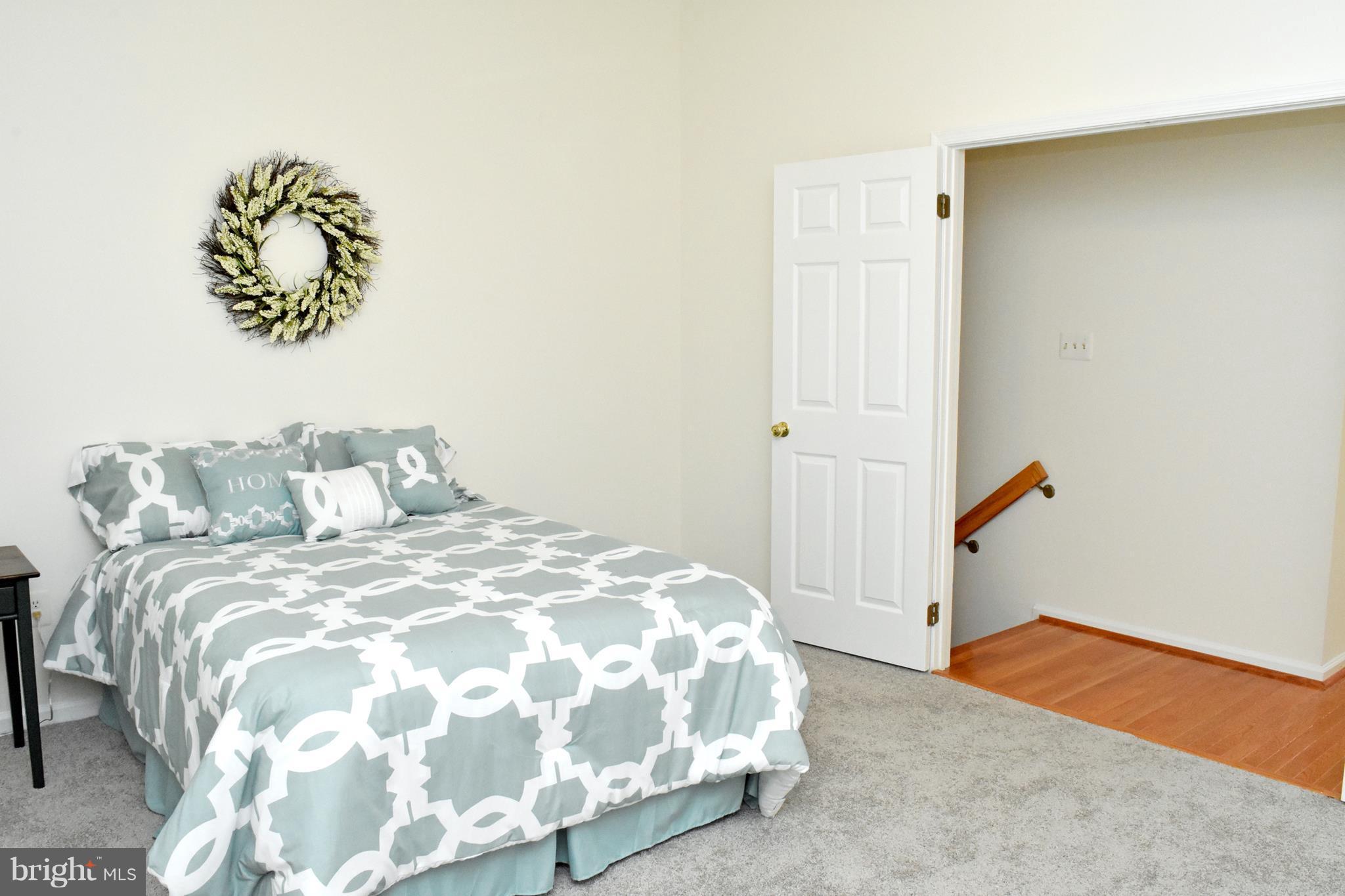 9238 Ispahan Loop Laurel, MD 20708 - Photo 20 of 30 Double door opens to master bedroom