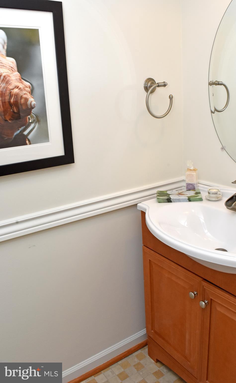 9238 Ispahan Loop Laurel, MD 20708 - Photo 21 of 30 Main floor powder room