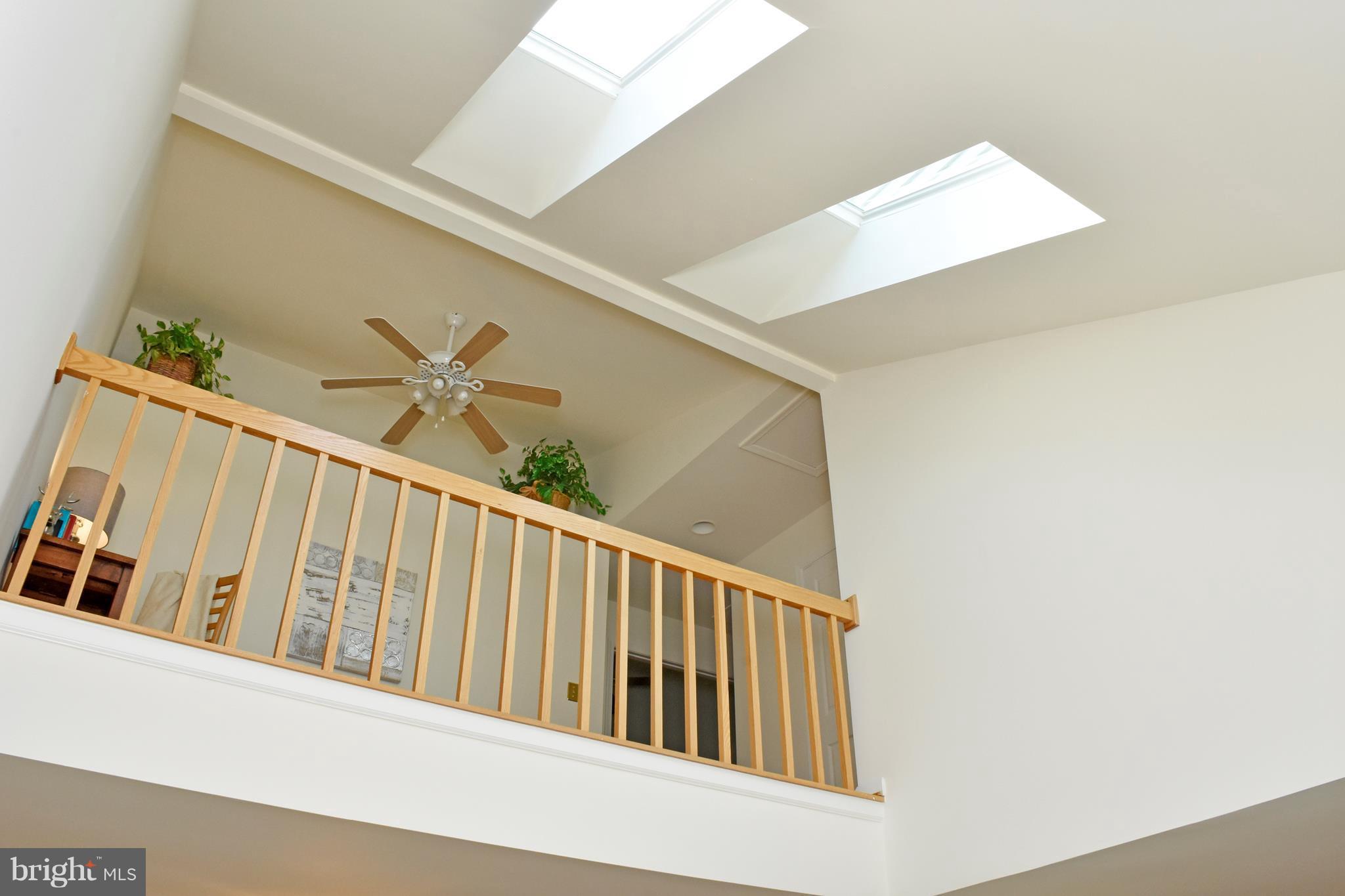 9238 Ispahan Loop Laurel, MD 20708 - Photo 5 of 30 2 story family opens to skylights & loft