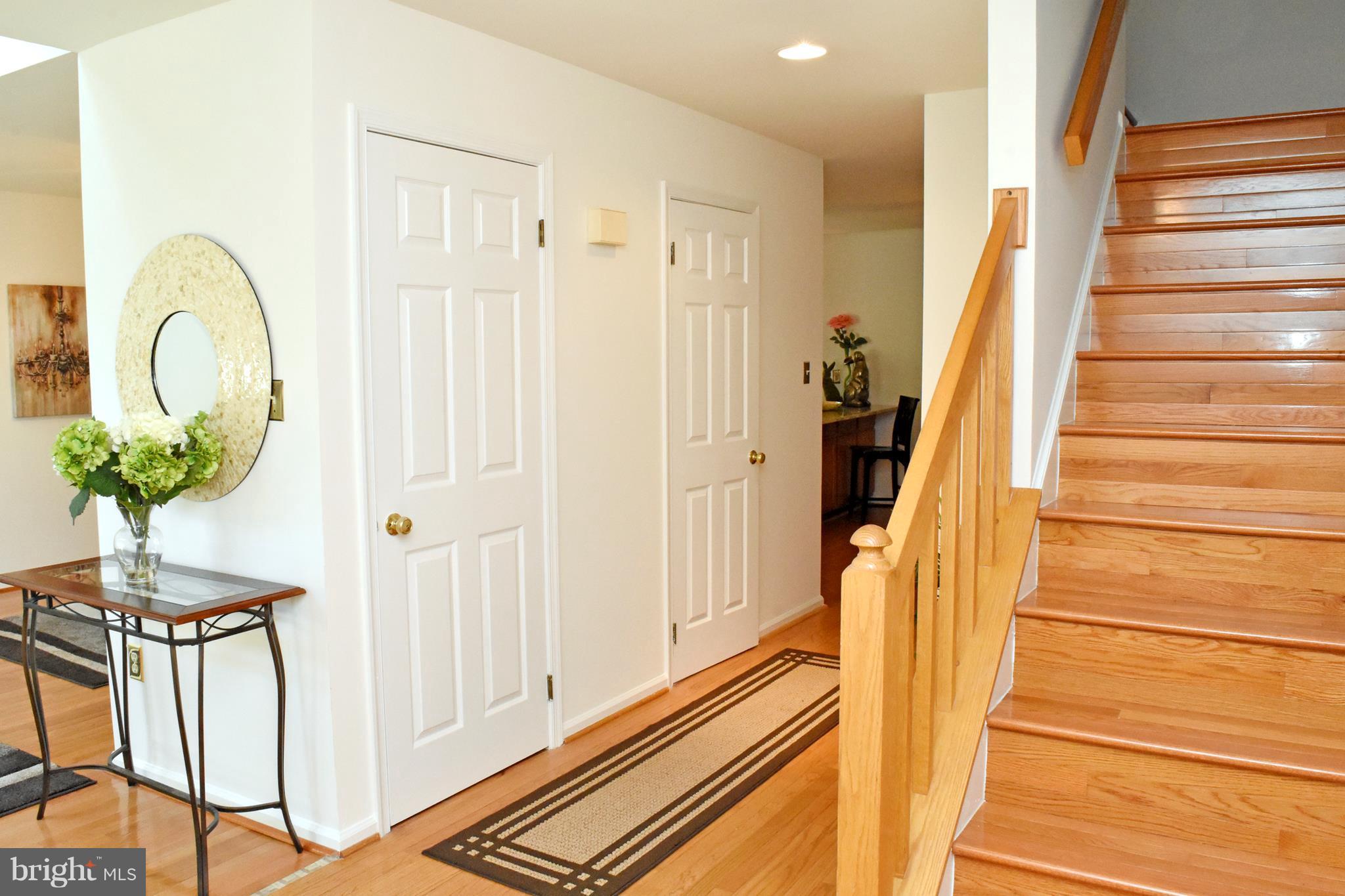 9238 Ispahan Loop Laurel, MD 20708 - Photo 7 of 30 Hardwood up the stairs to Loft