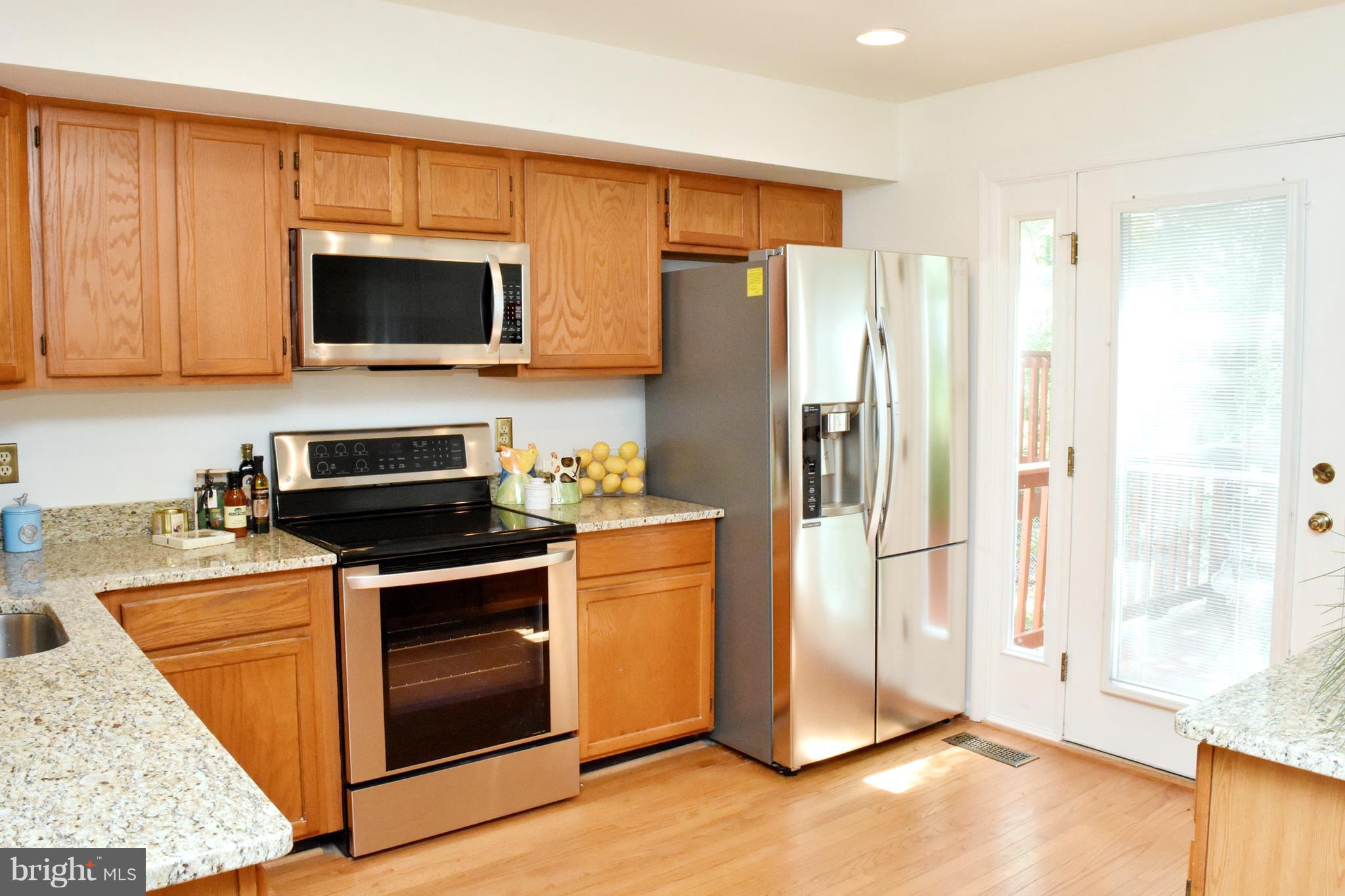 9238 Ispahan Loop Laurel, MD 20708 - Photo 9 of 30 New SS appliances & granite countertops