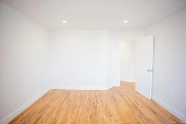 a view of balcony with wooden floor