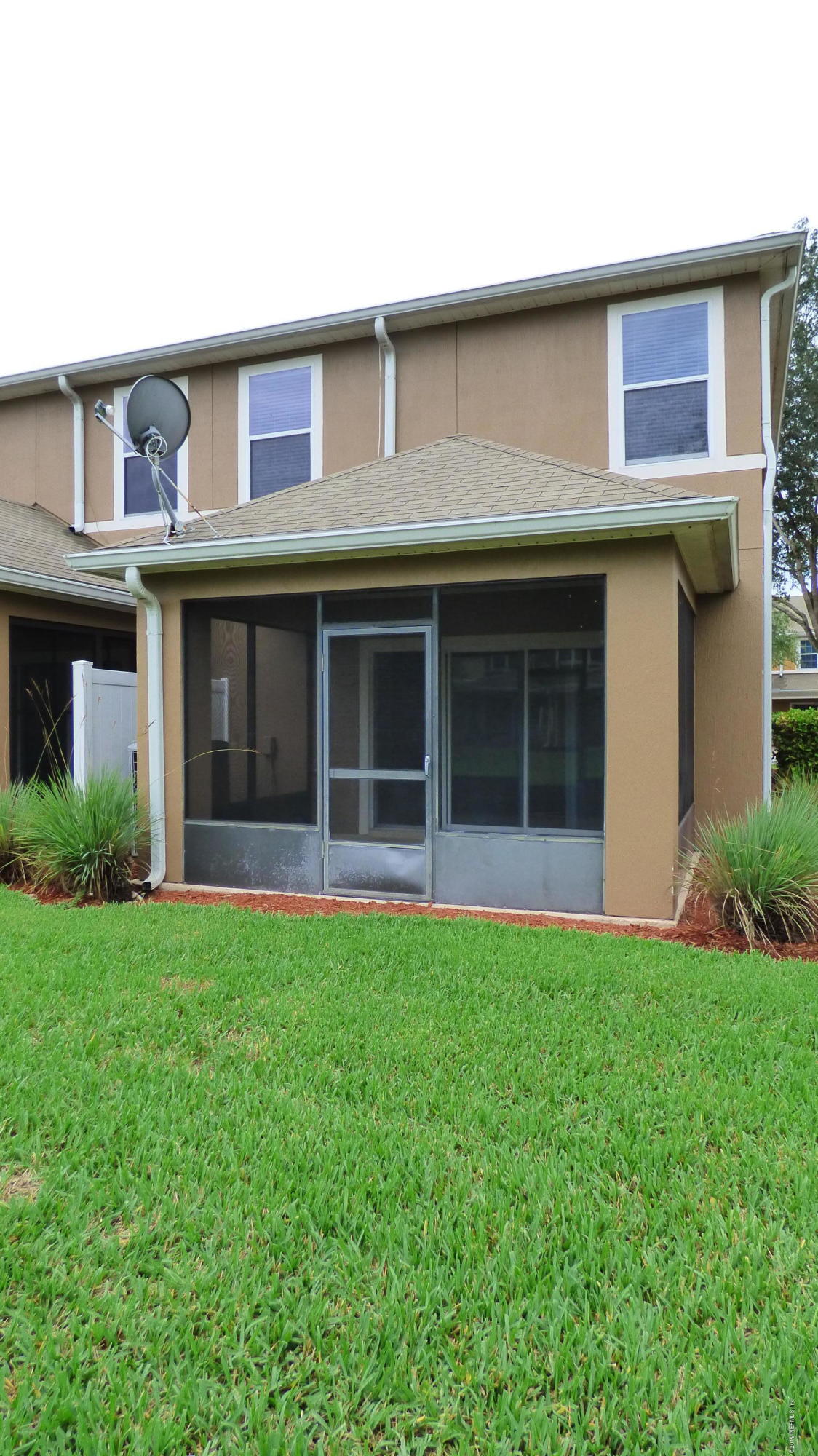 12989 Spring Rain Road Jacksonville, FL 32258 - Photo 16 of 20 a view of a house with yard and front view of a house