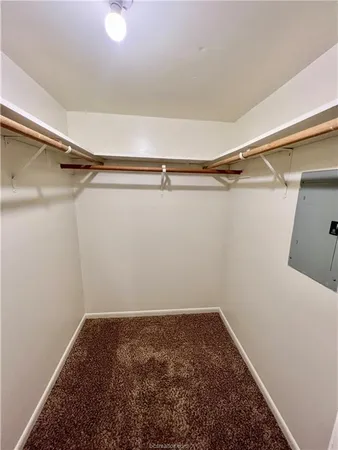 a view of a room with racks on the wall