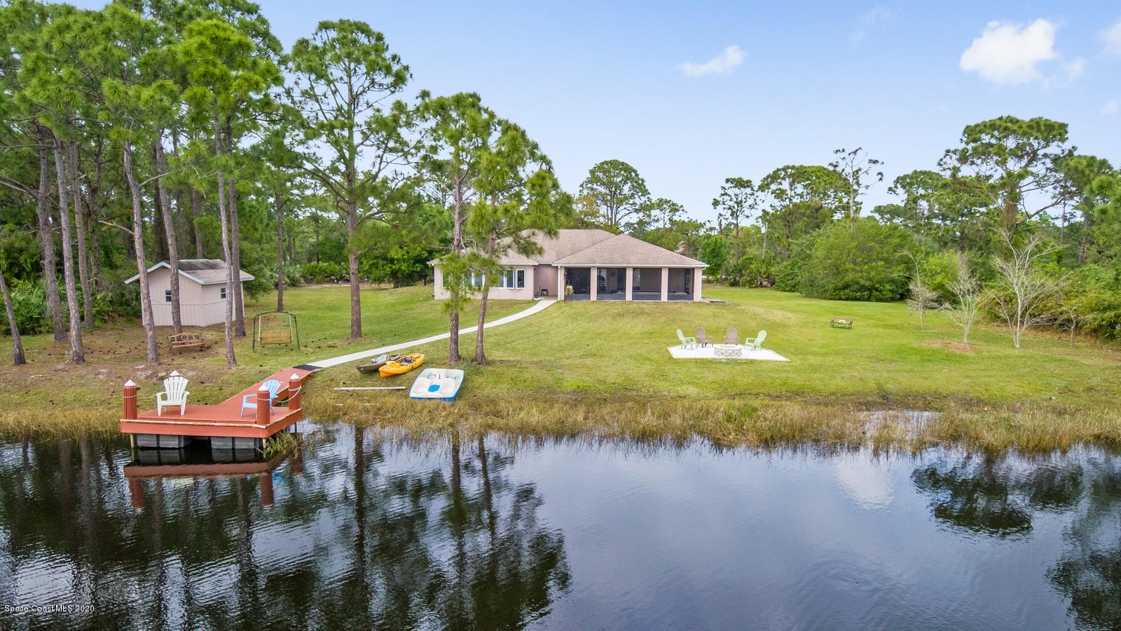 1301 Grant Road Grant Valkaria, FL 32949 - Photo 1 of 44 Lakefront Oasis