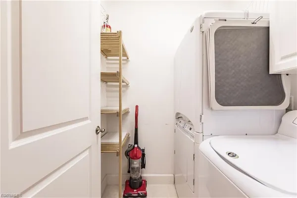 a bathroom with a tub and shower