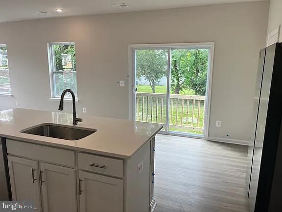406 Freeman Street Ranson, WV 25438 - Photo 3 of 6 a kitchen with a sink and large window