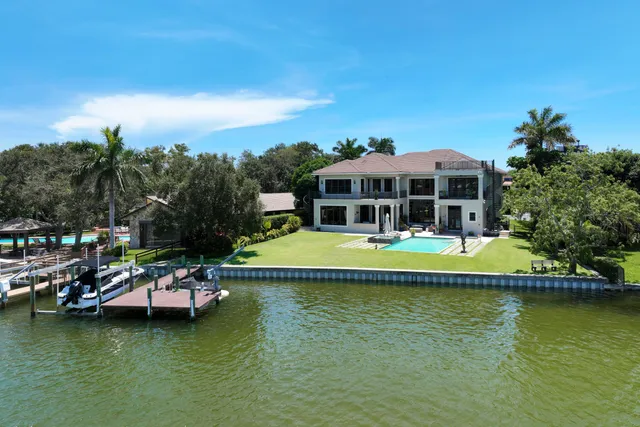 a view of a swimming pool with lounge chair
