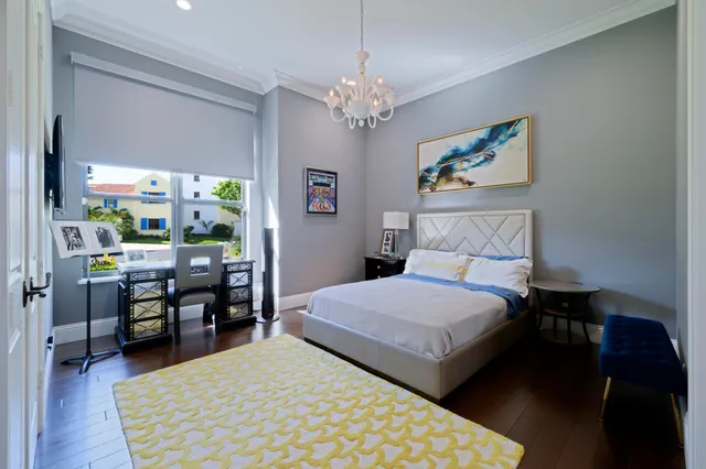 an aerial view of a house with a lake view