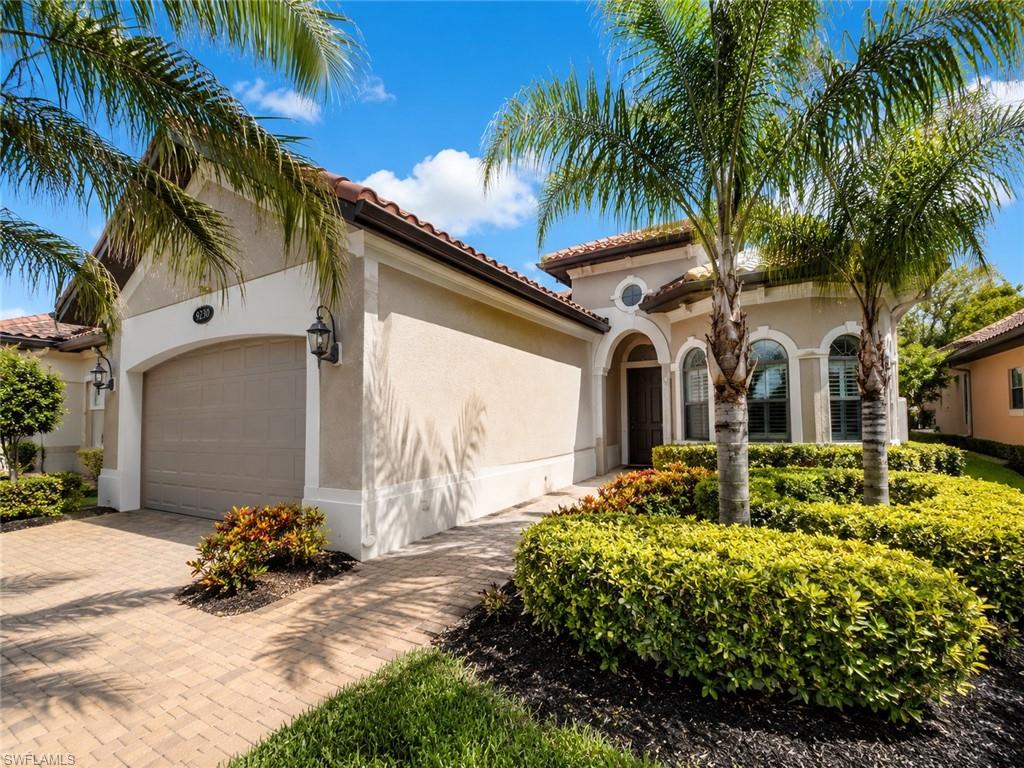 6574 Amarone Lane Naples, FL 34113 - Photo 1 of 44 a view of a house with a patio
