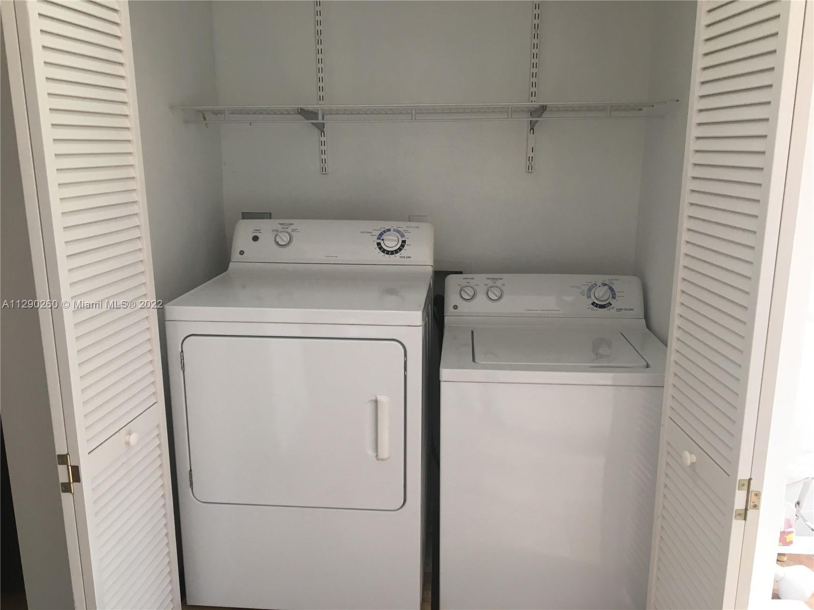 6442 Southwest 37th Street Miami, FL 33155 - Photo 10 of 14 a utility room with dryer and washer