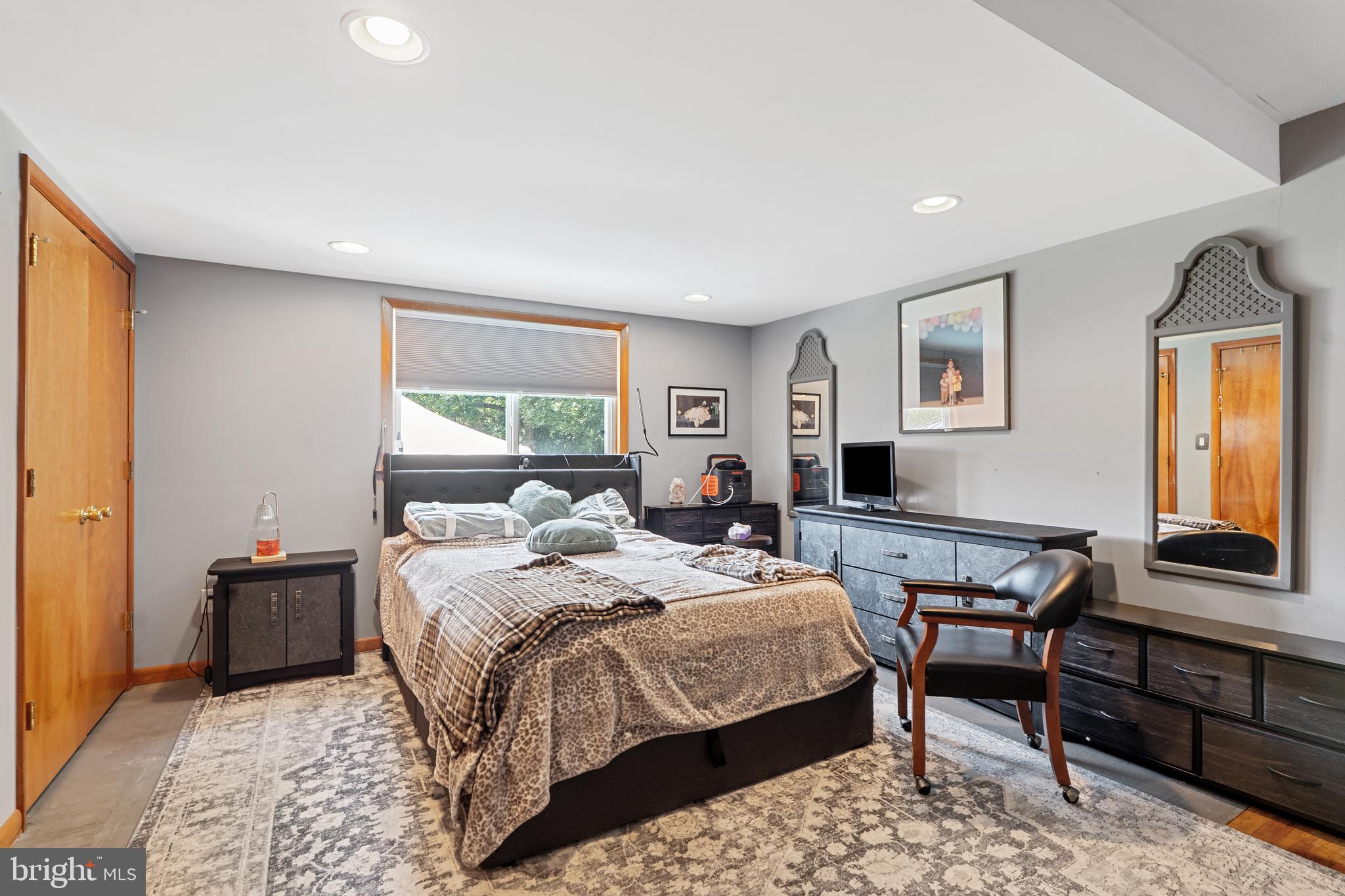 602 Rancocas Avenue Riverside, NJ 08075 - Photo 14 of 40 a bedroom with a bed and wooden floor