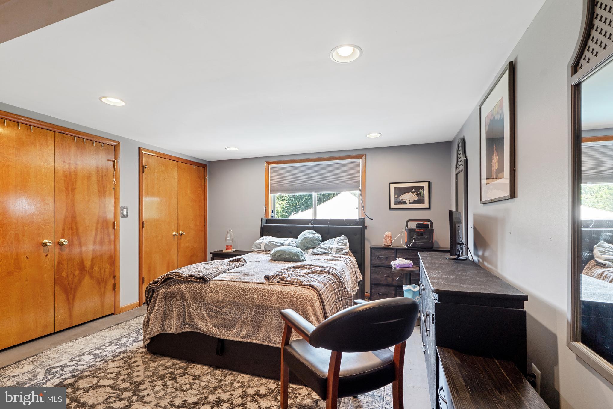 602 Rancocas Avenue Riverside, NJ 08075 - Photo 15 of 40 a bedroom with a bed and wooden floor