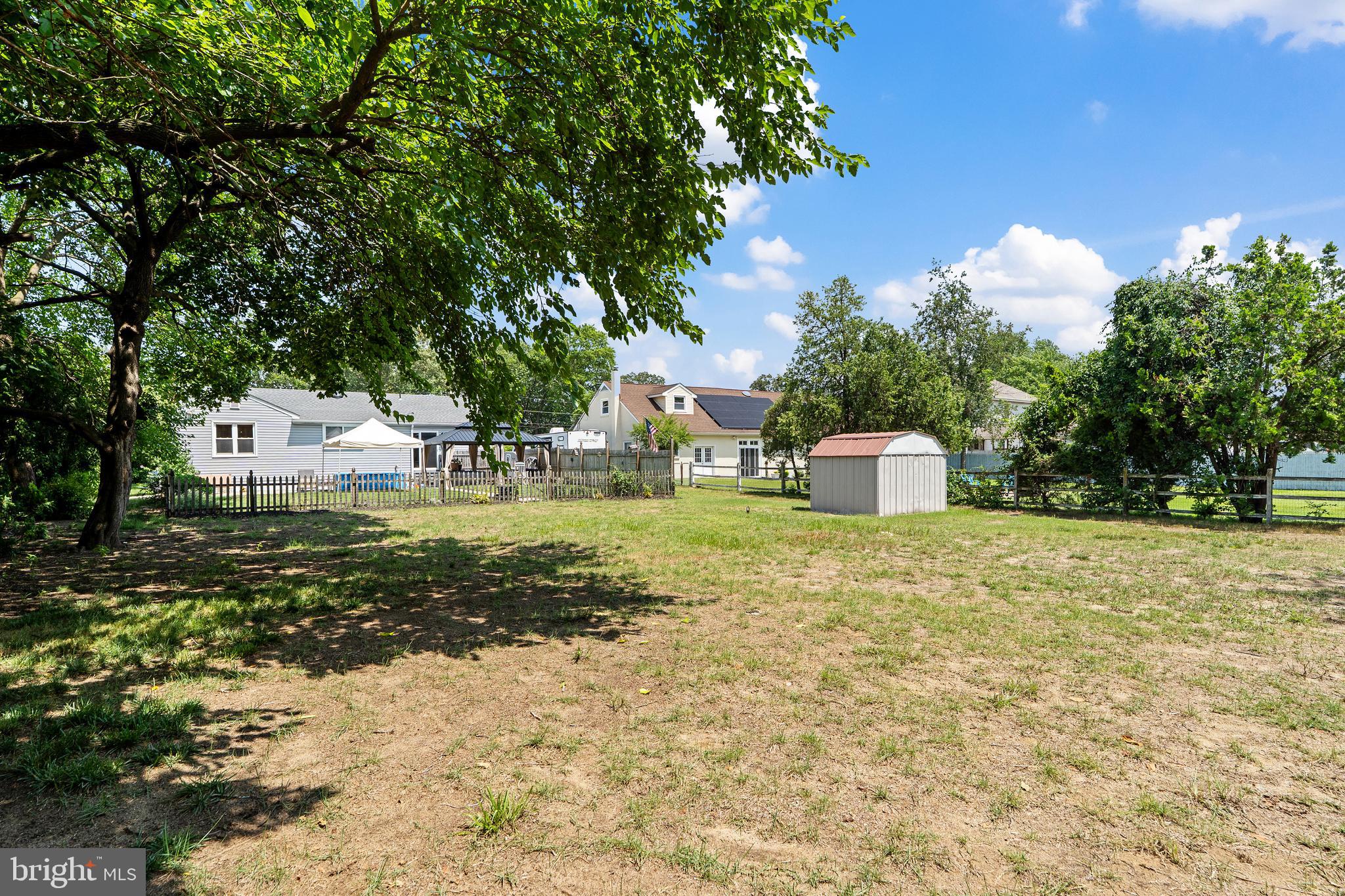 602 Rancocas Avenue Riverside, NJ 08075 - Photo 33 of 40 a backyard of a house with a yard and outdoor seating