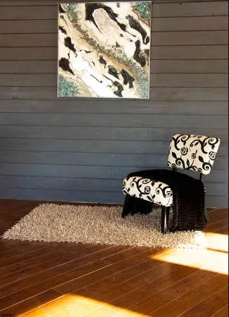 a room with two separate beds and large windows