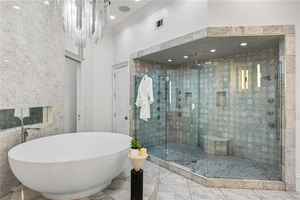 5320 Riverview Road Northwest Atlanta, GA 30339 - Photo 24 of 83 a bathroom with a bathtub and shower