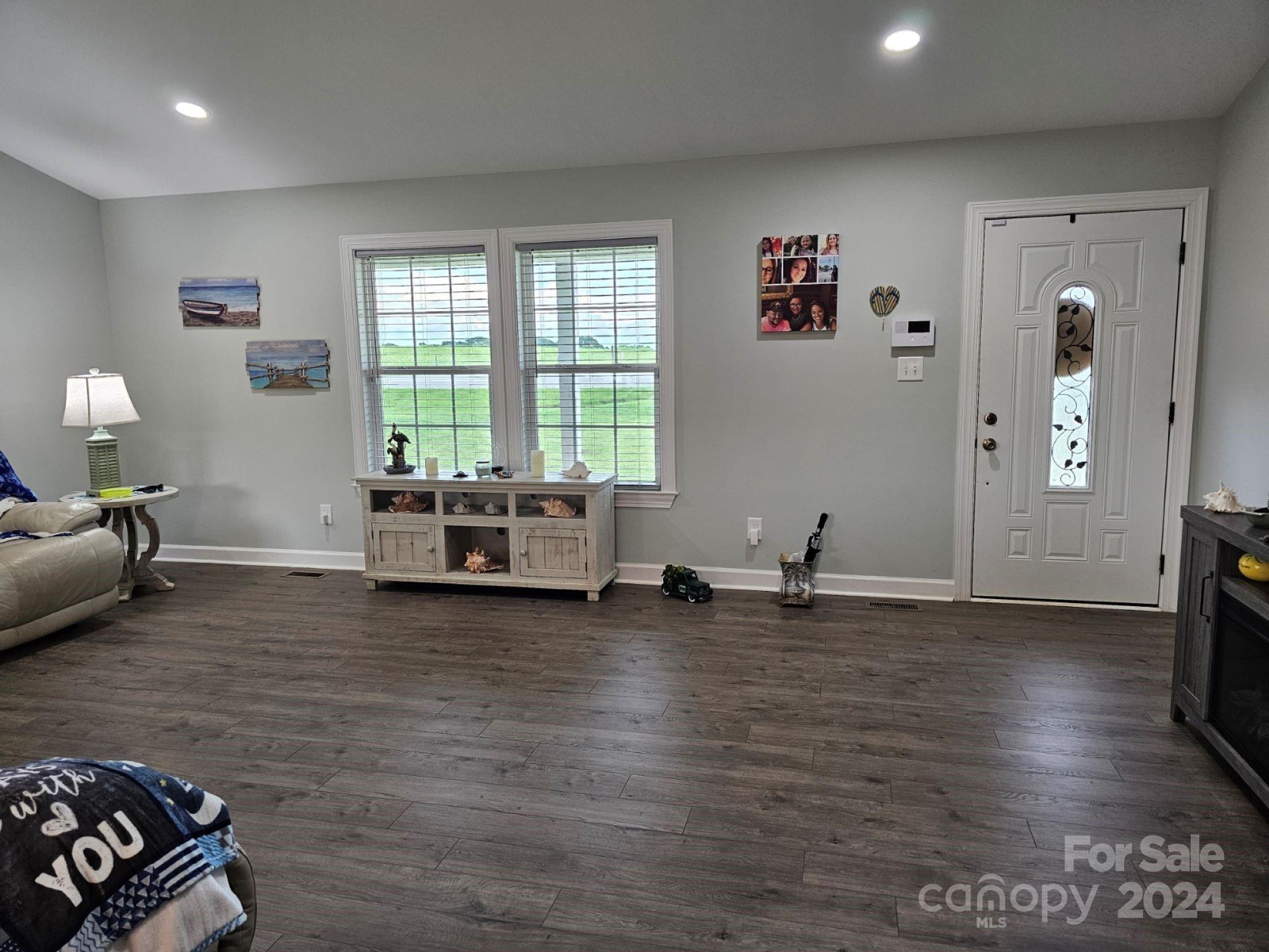 302 Flint Hill Road Cherryville, NC 28021 - Photo 11 of 32 a living room with furniture and a large window