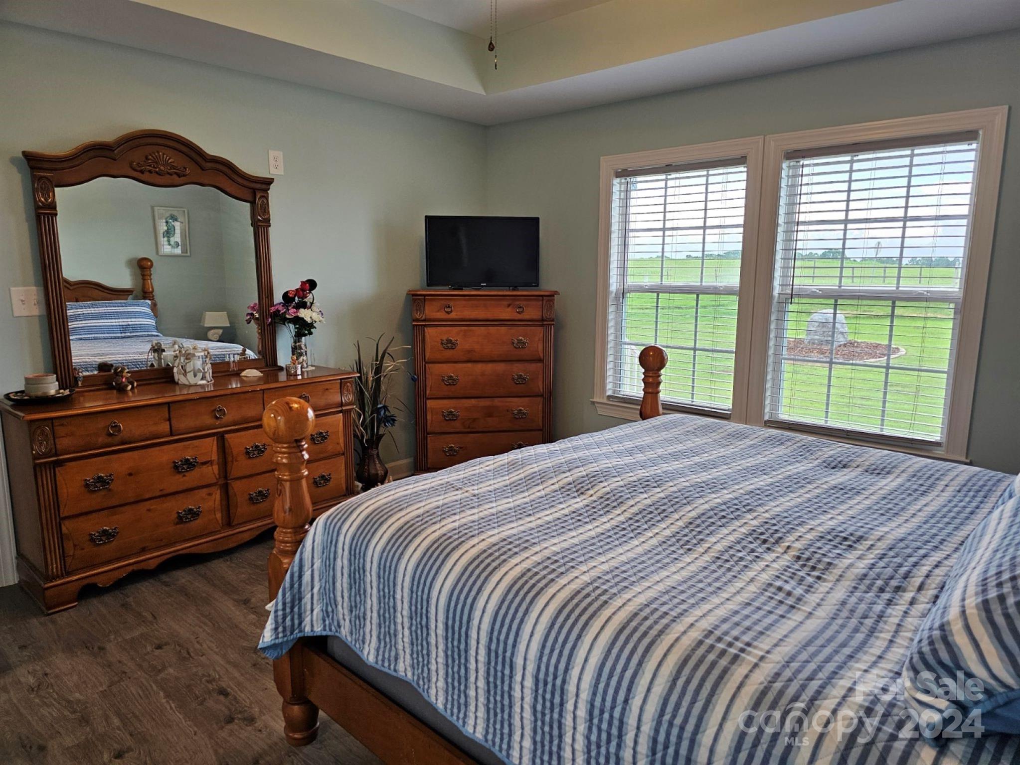 302 Flint Hill Road Cherryville, NC 28021 - Photo 26 of 32 a bedroom with a bed and a dresser