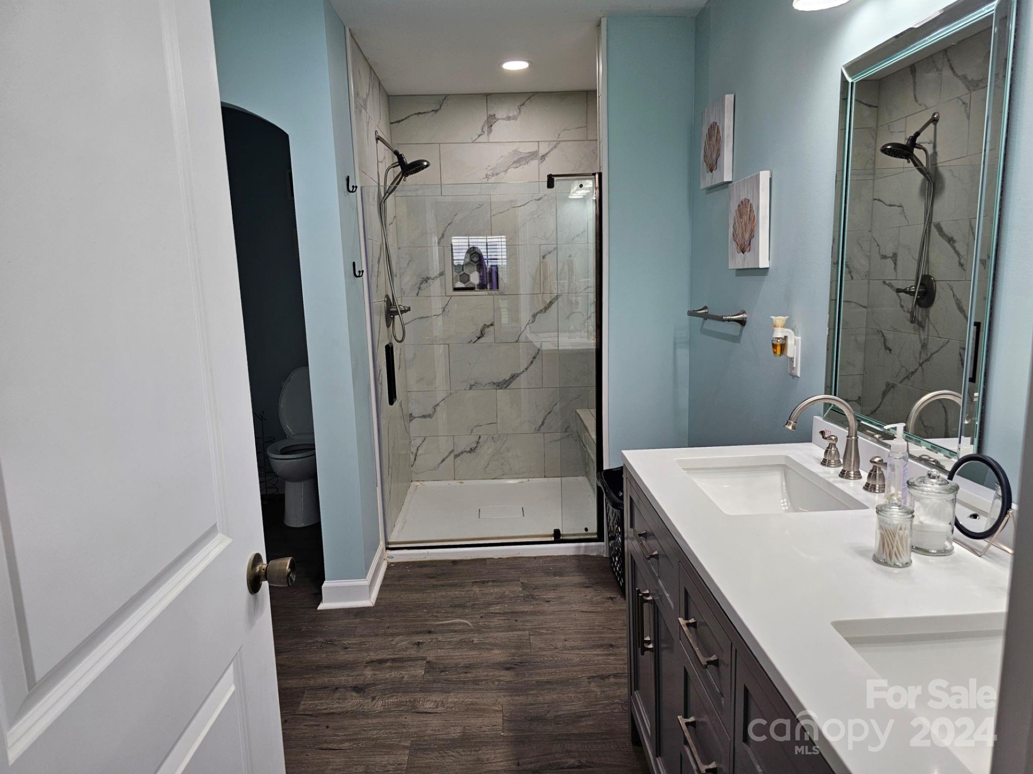 302 Flint Hill Road Cherryville, NC 28021 - Photo 27 of 32 a bathroom with a sink a shower and a mirror