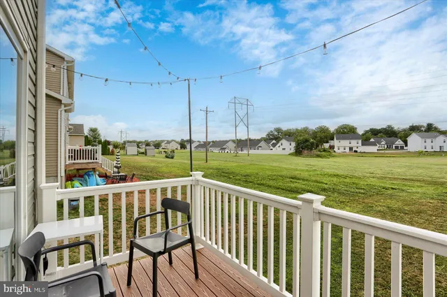 a view of a balcony with ocean view