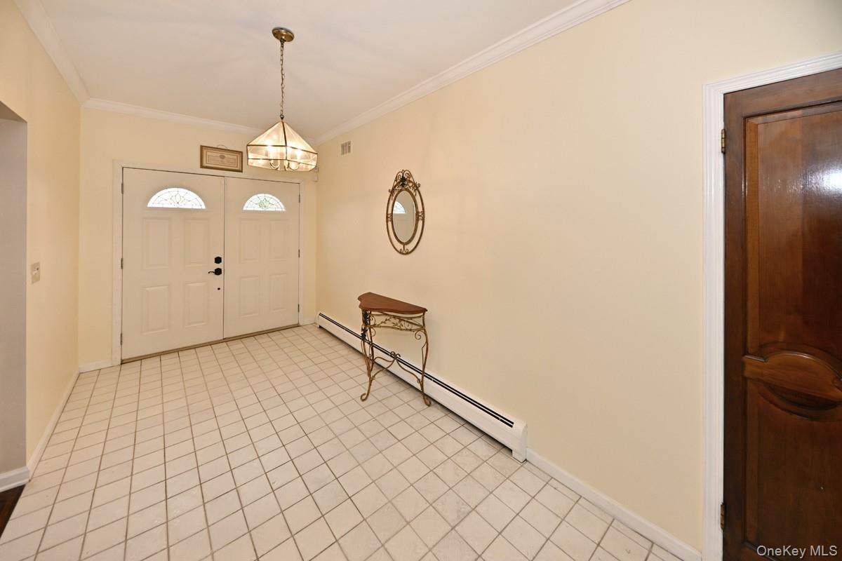 19 Sterling Road Spring Valley, NY 10977 - Photo 2 of 20 a view of a room with wooden floor