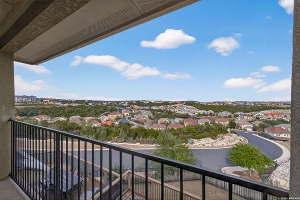 a view of room with furniture and windows