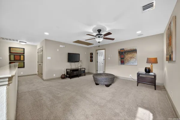 a room with a sink and a mirror