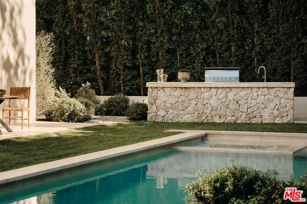 a view of a garden with an outdoor space