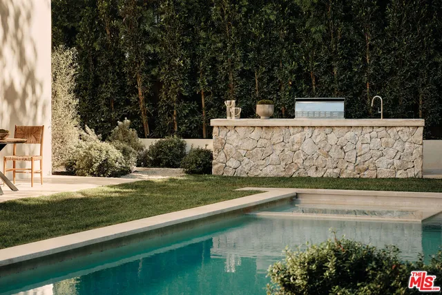 a view of a garden with an outdoor space