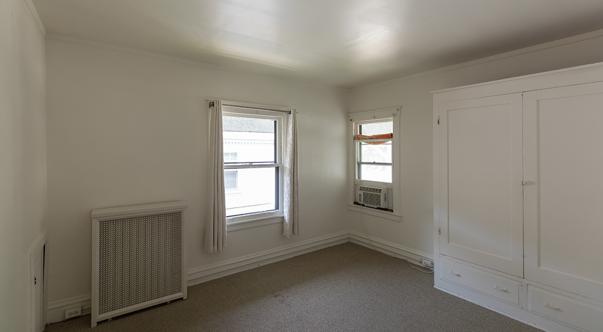 202 Ridgeland Avenue, Unit 2 Oak Park, IL 60302 - Photo 14 of 34 an empty room with windows and closet