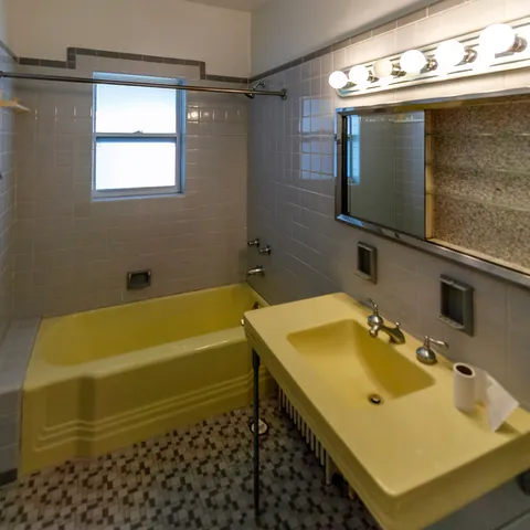 a bathroom with a sink and a bathtub