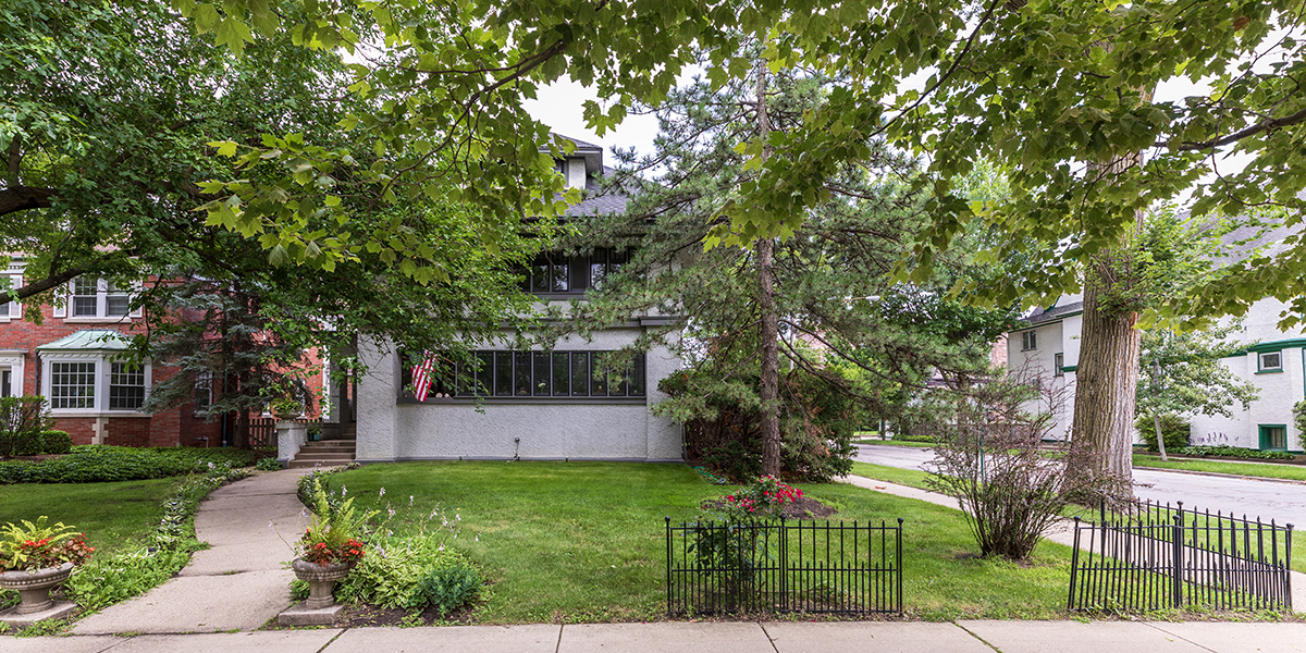 202 Ridgeland Avenue, Unit 2 Oak Park, IL 60302 - Photo 2 of 34 a front view of a house with a yard and tree