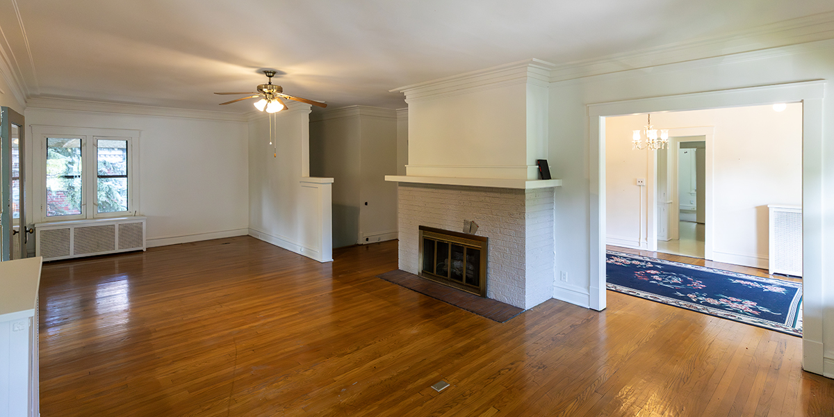 202 Ridgeland Avenue, Unit 2 Oak Park, IL 60302 - Photo 30 of 34 a view of an empty room with wooden floor and a window
