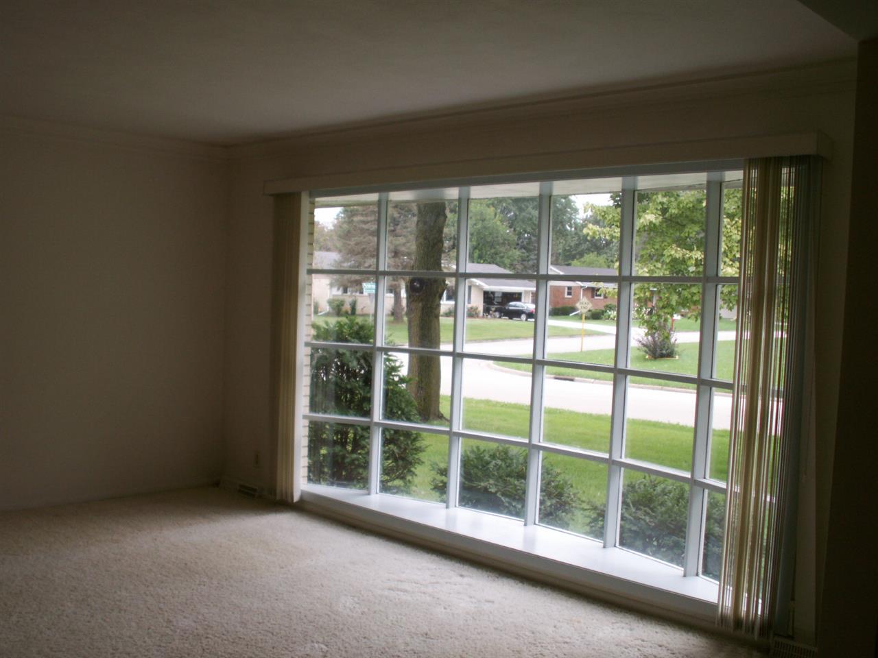 5407 Brookview Road Rockford, IL 61107 - Photo 8 of 16 a view of a room with window