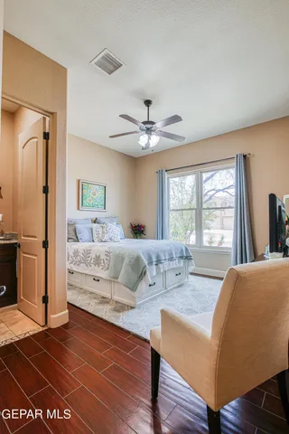 a bedroom with a bed and closet