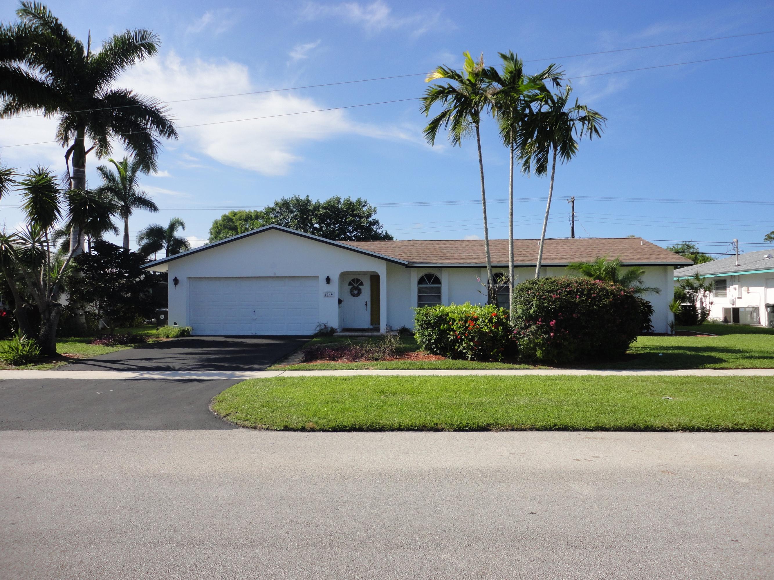 1349 Northwest 7th Street Boca Raton, FL 33486 - Photo 1 of 37 Front