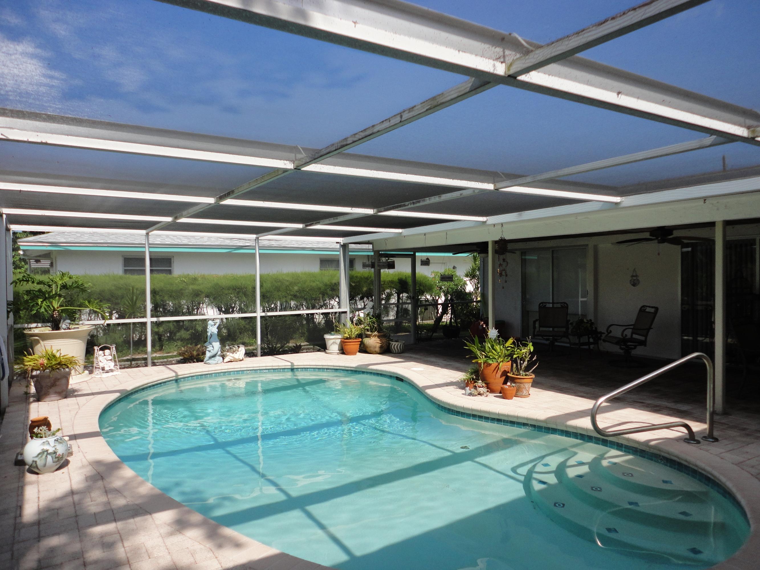 1349 Northwest 7th Street Boca Raton, FL 33486 - Photo 25 of 37 Pool/Screened Patio