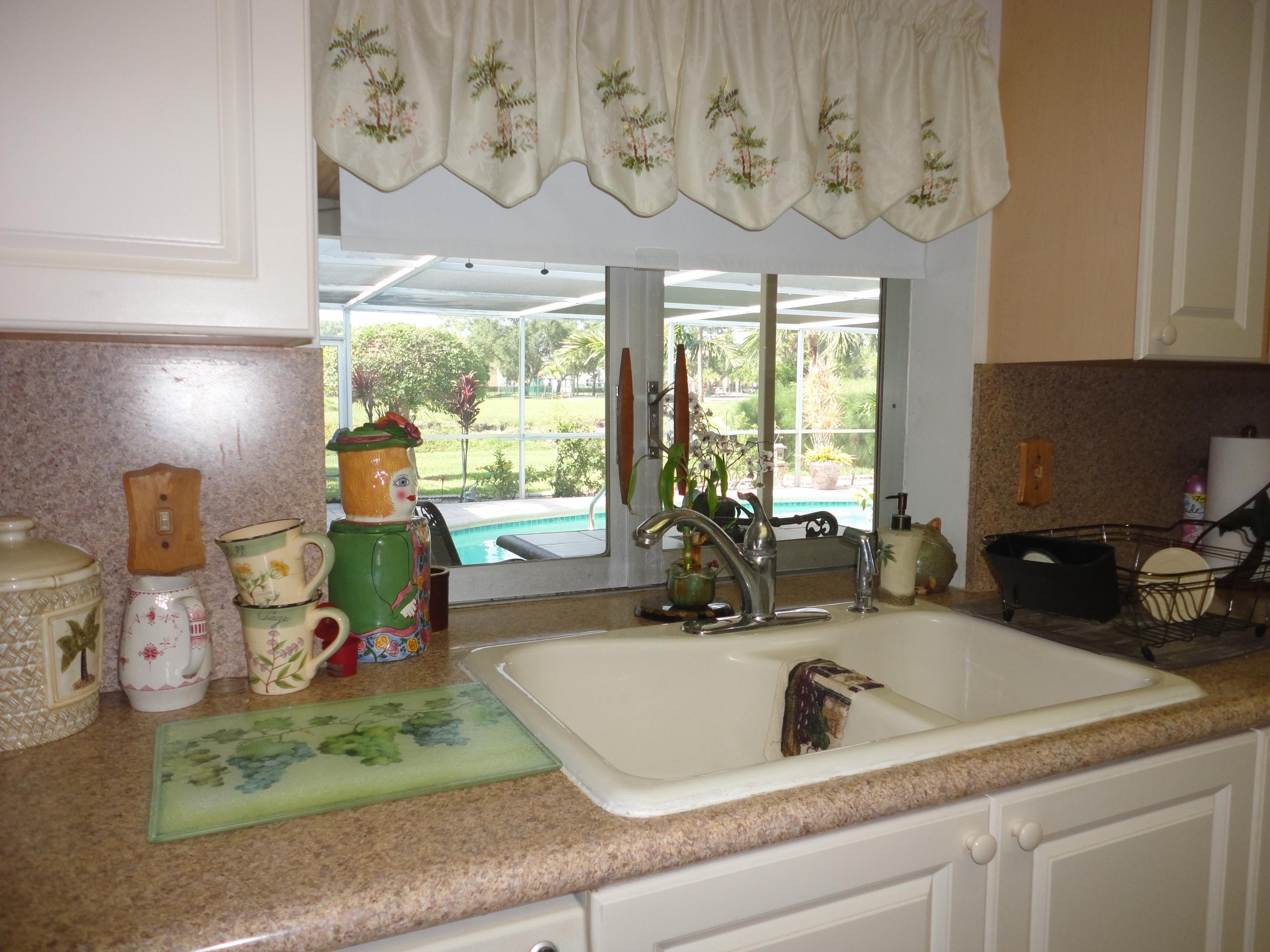1349 Northwest 7th Street Boca Raton, FL 33486 - Photo 8 of 37 Updated Kitchen/with pool view