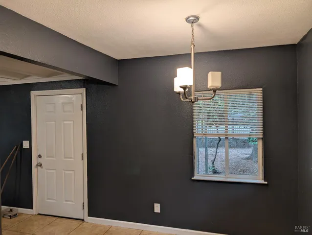 a dining room with a window