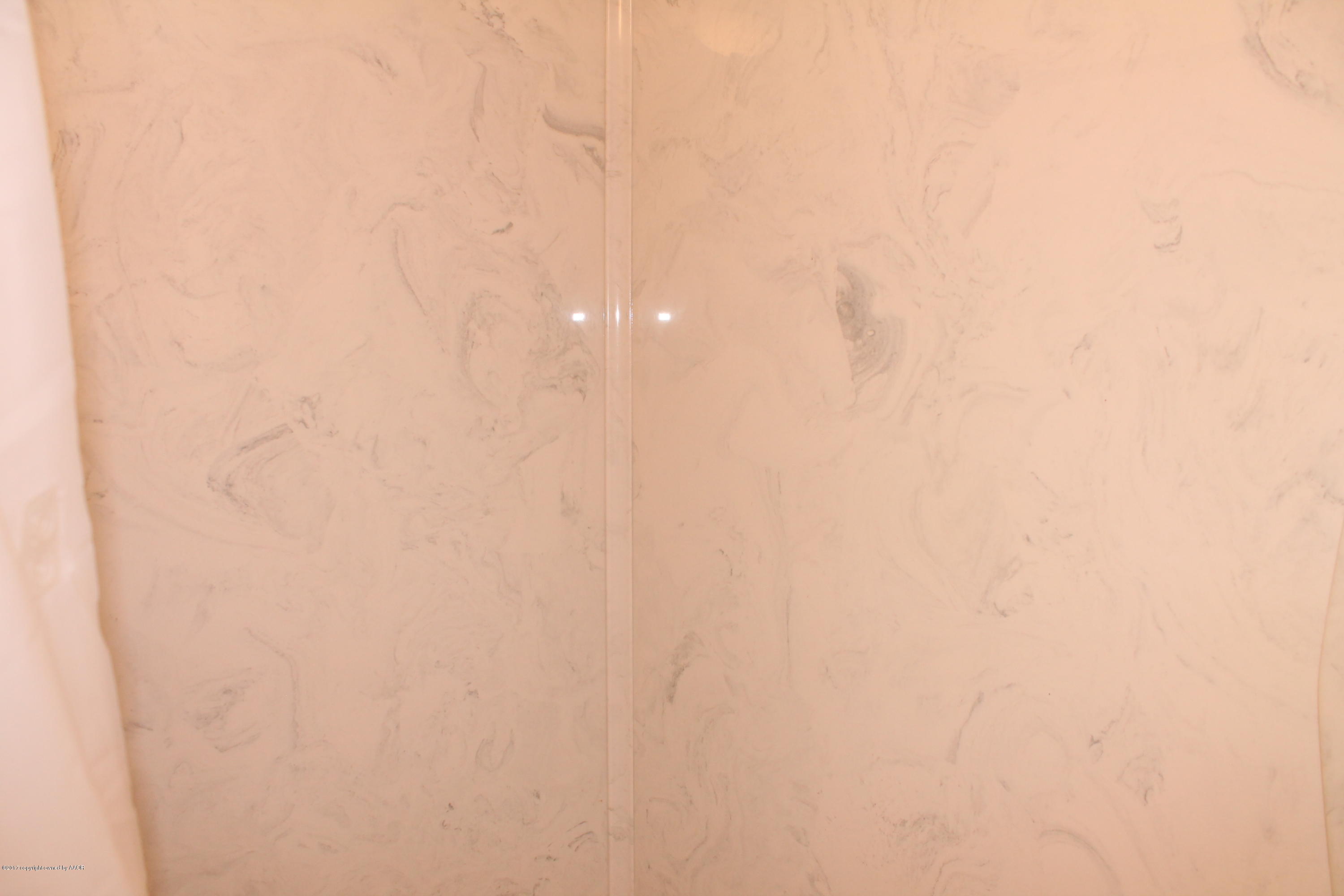 6002 Calumet Road Amarillo, TX 79106 - Photo 24 of 38 New Marble in Main Bathroom Tub
