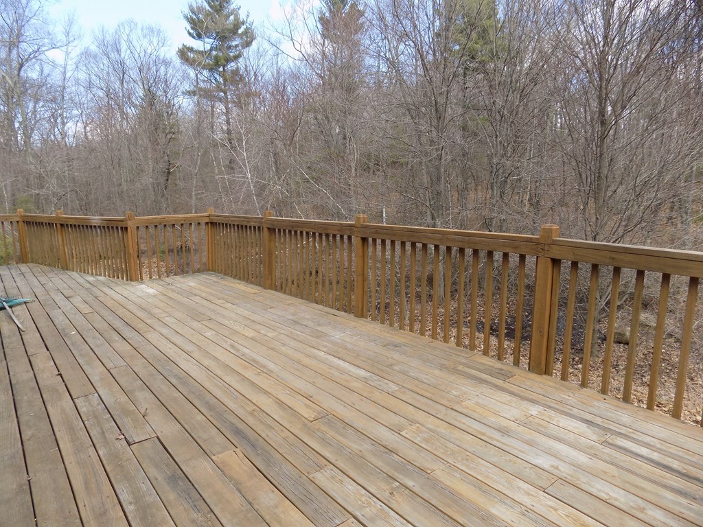 167 Union Road Wales, MA 01081 - Photo 12 of 16 a view of balcony with wooden floor
