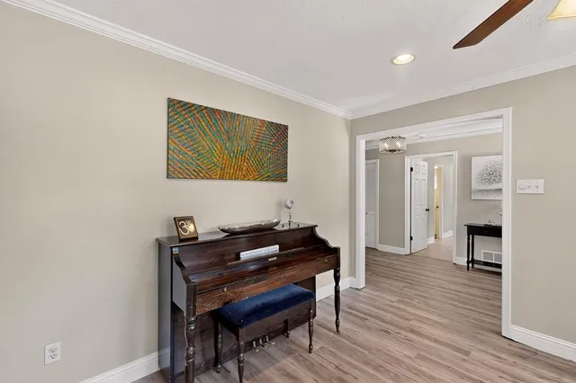 a room with furniture and wooden floor