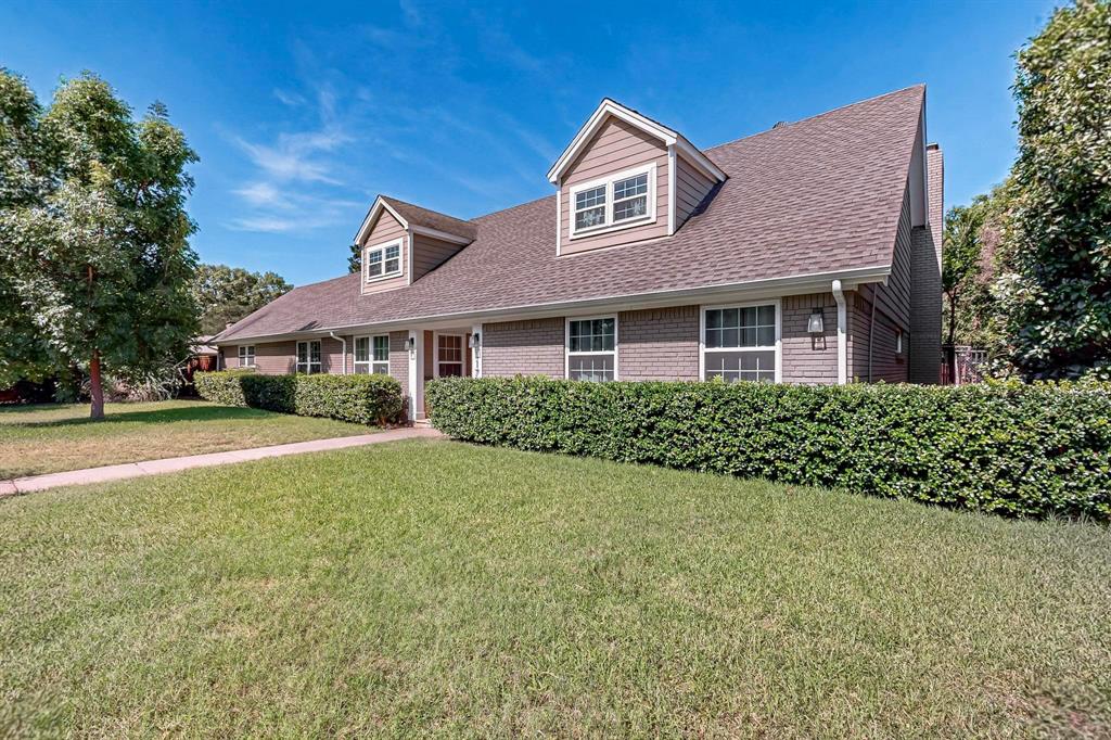 11717 Welch Road Dallas, TX 75229 - Photo 2 of 40 a front view of a house with a yard