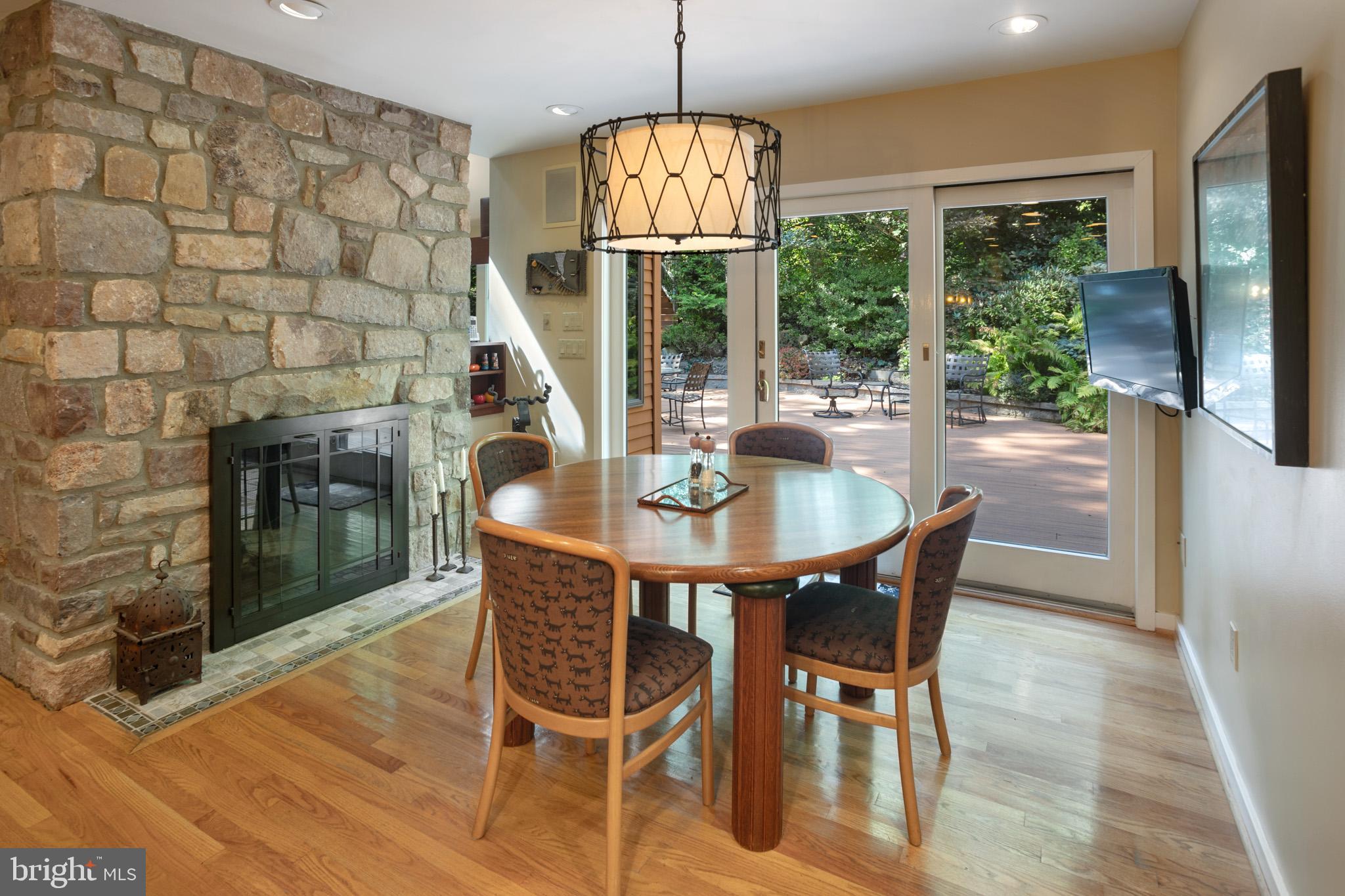 1680 Paper Mill Road Jenkintown, PA 19046 - Photo 14 of 41 Breakfast Room with Double-sided Fireplace