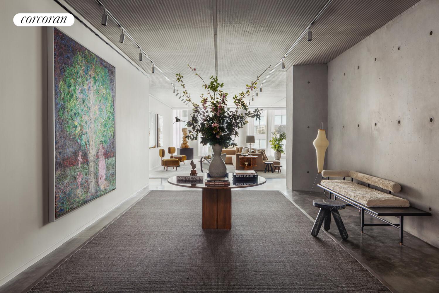 100 East 53rd Street, Unit 5C Manhattan, NY 10022 - Photo 2 of 23 a living room with furniture and a large window