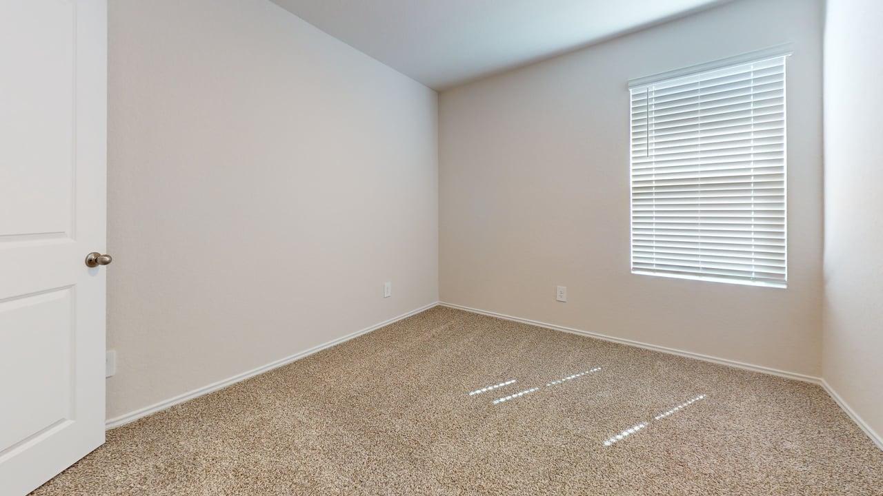 914 Indian Way Seguin, TX 78155 - Photo 11 of 18 an empty room with a window